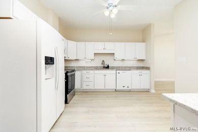 Immaculate! Move-in ready, this one-level townhome offers - photo 9
