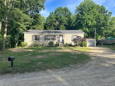 Barnes Lake Home For Sale in Columbiaville Michigan