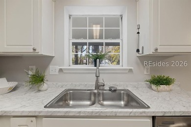 Freshly updated, this 4BR/2BA home located in The Farm offers a - photo 11