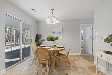 Freshly updated, this 4BR/2BA home located in The Farm offers a - photo 12