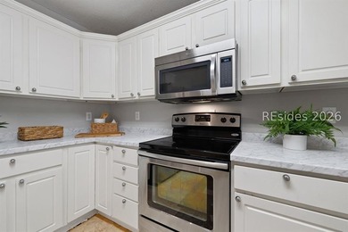 Freshly updated, this 4BR/2BA home located in The Farm offers a - photo 14