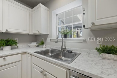 Freshly updated, this 4BR/2BA home located in The Farm offers a - photo 15