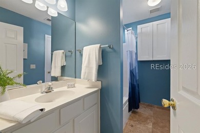 Freshly updated, this 4BR/2BA home located in The Farm offers a - photo 21