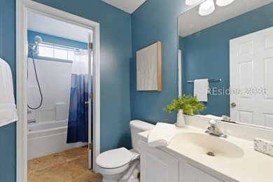 Freshly updated, this 4BR/2BA home located in The Farm offers a - photo 22