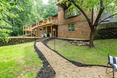 Thoroughly restored 5-bedroom, 5-bath home on 1.02 wooded acres - photo 49