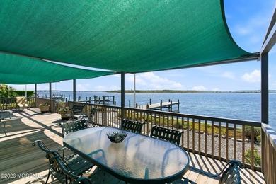 Nestled in the heart of prestigious Mantoloking, this bay front - photo 50