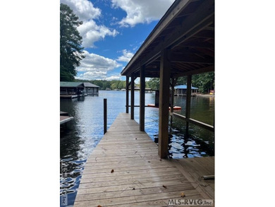 What are you waiting for? Here's a waterfront lot with an almost - photo 1
