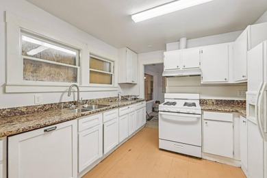 Welcome to 5826 Avenal Ave, a charming gated bungalow offering - photo 7