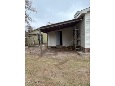 Well maintained 3 bedroom brick home with LOTS of outside