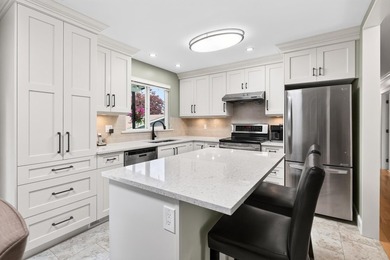 Welcome to this beautifully renovated 4-bedroom home, perfectly - photo 9