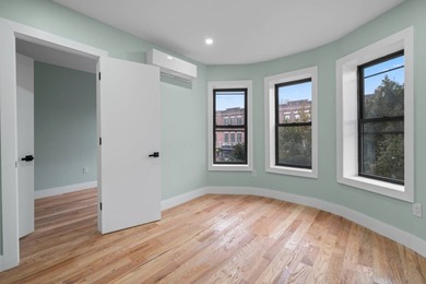 Brownstone Brand New Three family 2/3/3 Central heat and air - photo 11