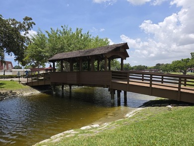 Located in the vibrant and social 55+ community of Covered - photo 1