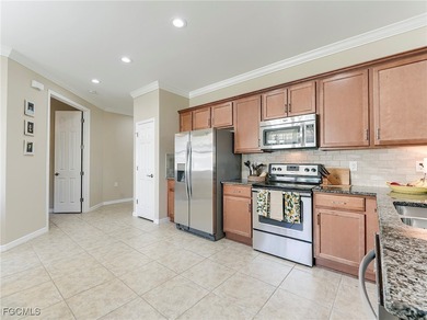 This stunning WCI-built Areca model offers an extended great