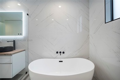 Discover this one-of-a-kind 5-bedroom, 5.5-bath modern townhome - photo 28