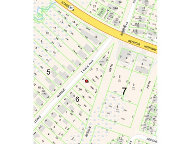 TWO Marsh Front vacant lots! Rare commercial-zoned lot on Tybee - photo 9