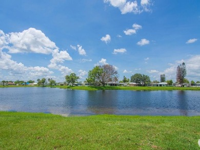 Welcome to this beautifully maintained 3/2/2 lakefront home - photo 8