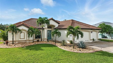 WATERFRONT POOL HOME WITH 120 FEET OF SEAWALL IN SOUTH GULF - photo 2