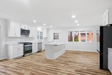 Experience modern comfort in this fully renovated 4-bedroom, 2