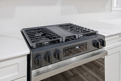 Experience modern comfort in this fully renovated 4-bedroom, 2