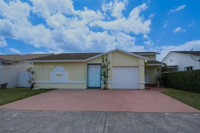 This charming 1988-built residence offers three bedrooms and two - photo 1