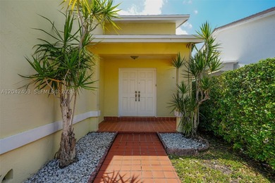 This charming 1988-built residence offers three bedrooms and two - photo 2