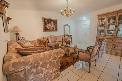 This charming 1988-built residence offers three bedrooms and two - photo 3