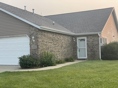 This ranch 2BR/2BA duplex delivers low-maintenance living - photo 1