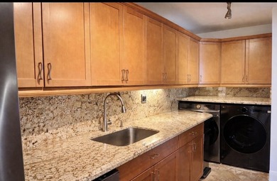 Two bedroom 2.5 bath with Ocean Views & North Exposure..Updated - photo 17
