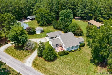Full of character and thoughtfully maintained, this Lake Gaston - photo 1