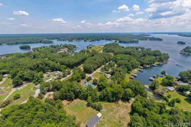 Opportunity awaits at Lake Gaston! Situated on approximately 1 - photo 1
