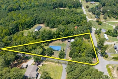 Opportunity awaits at Lake Gaston! Situated on approximately 1 - photo 2
