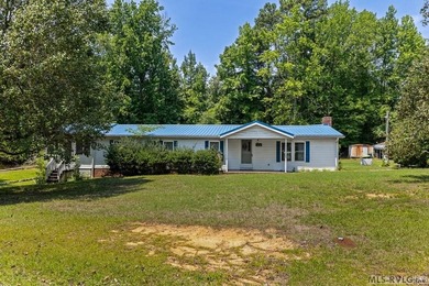 Opportunity awaits at Lake Gaston! Situated on approximately 1 - photo 5