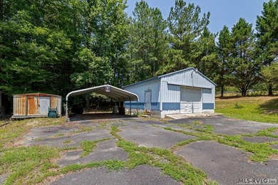 Opportunity awaits at Lake Gaston! Situated on approximately 1 - photo 8
