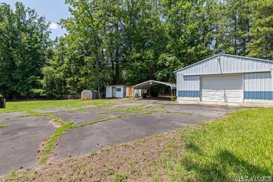 Opportunity awaits at Lake Gaston! Situated on approximately 1 - photo 9
