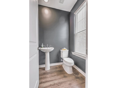 Built in the fall of 2024, this beautifully maintained end-unit - photo 13