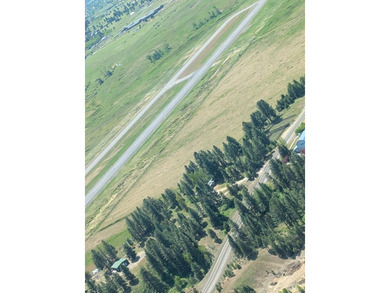 Located on the edge of the City of McCall, you will discover an - photo 13