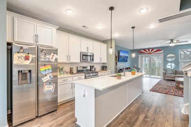 Built in the fall of 2024, this beautifully maintained end-unit - photo 15