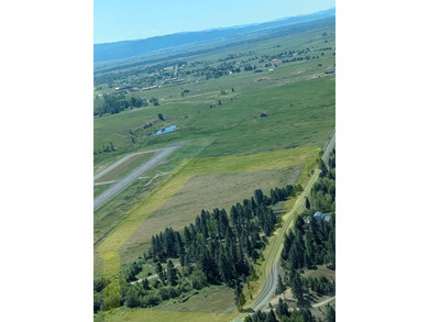 Located on the edge of the City of McCall, you will discover an - photo 15