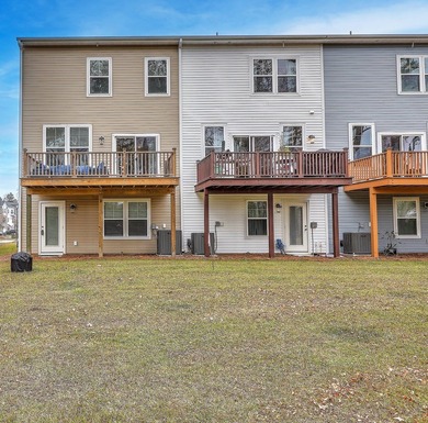 Built in the fall of 2024, this beautifully maintained end-unit - photo 32