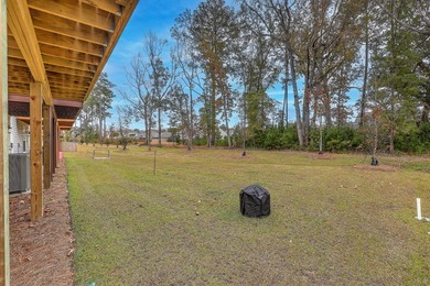 Built in the fall of 2024, this beautifully maintained end-unit - photo 34