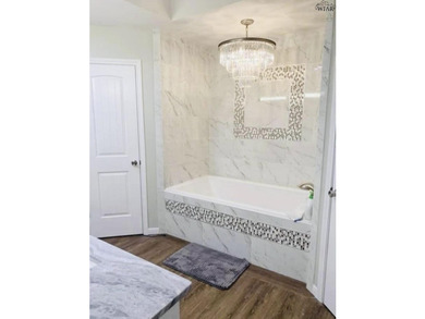 Updated 3 bedroom, 2 bath Country Club home on a corner lot! The - photo 11