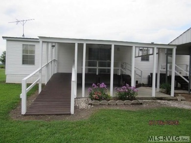 WELL MAINTAINED HOME. HAS A WHEELCHAIR RAMP.HOME IS - photo 10