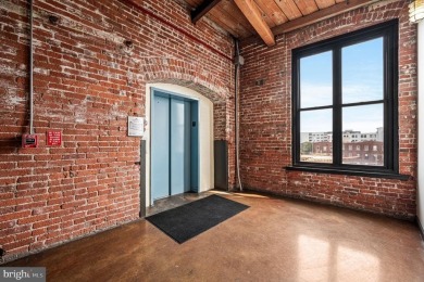 Spectacular Corner Loft in the Iconic Cigar Factory. This