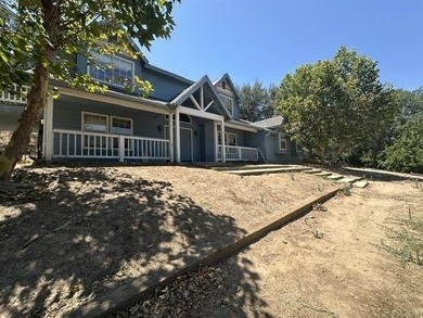 This 3-bedroom, 3-bath home in Three Rivers offers the best of - photo 2