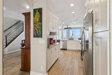 Set within a gated, waterfront community in Oldsmar, this - photo 13