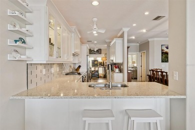 Set within a gated, waterfront community in Oldsmar, this - photo 14