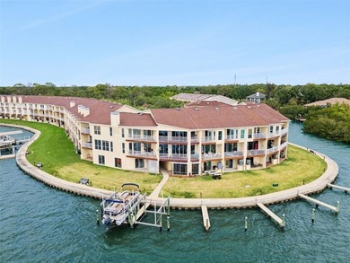Set within a gated, waterfront community in Oldsmar, this - photo 34