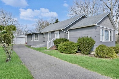 Welcome to 265 Hummel Ave in Southold, a charming two-bedroom - photo 1