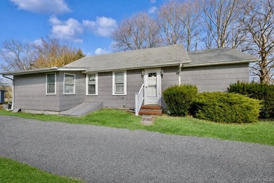 Welcome to 265 Hummel Ave in Southold, a charming two-bedroom - photo 2