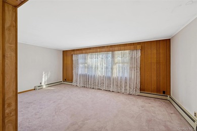 Welcome to 265 Hummel Ave in Southold, a charming two-bedroom - photo 4